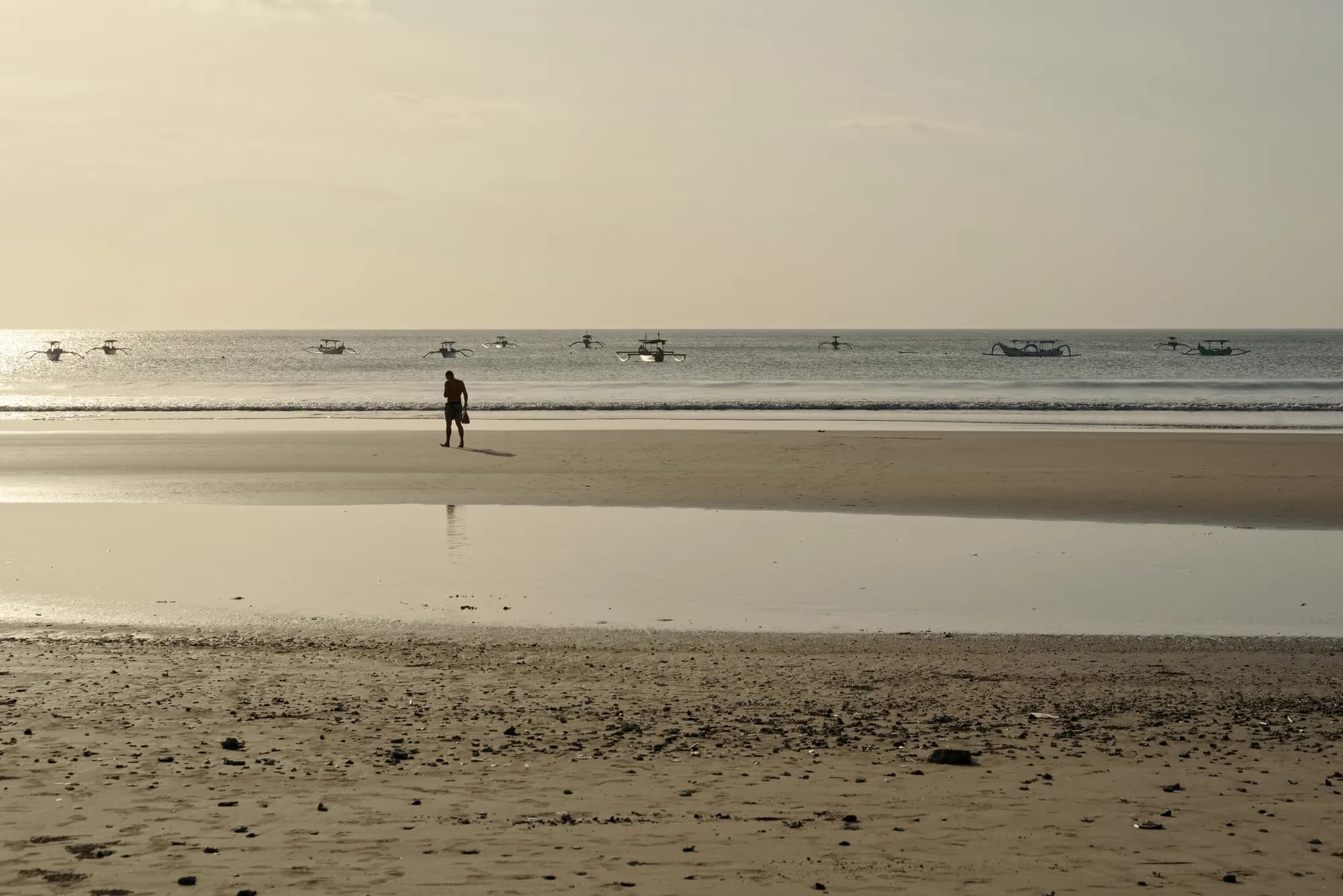 Golden late-afternoon light on Kuta Beach, Bali